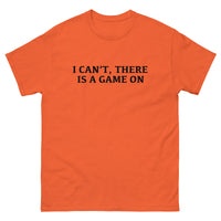 100% cotton classic tee with a more structured look...trendy! "I CAN'T THERE IS A GAME ON"