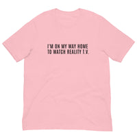 Unisex t-shirt feels soft and lightweight, with the right amount of stretch "I'M ON MY WAY HOME TO WATCH REALITY T.V."